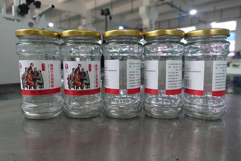 BK-311 semi-automatic round bottle labeling machine for honey bottle video
